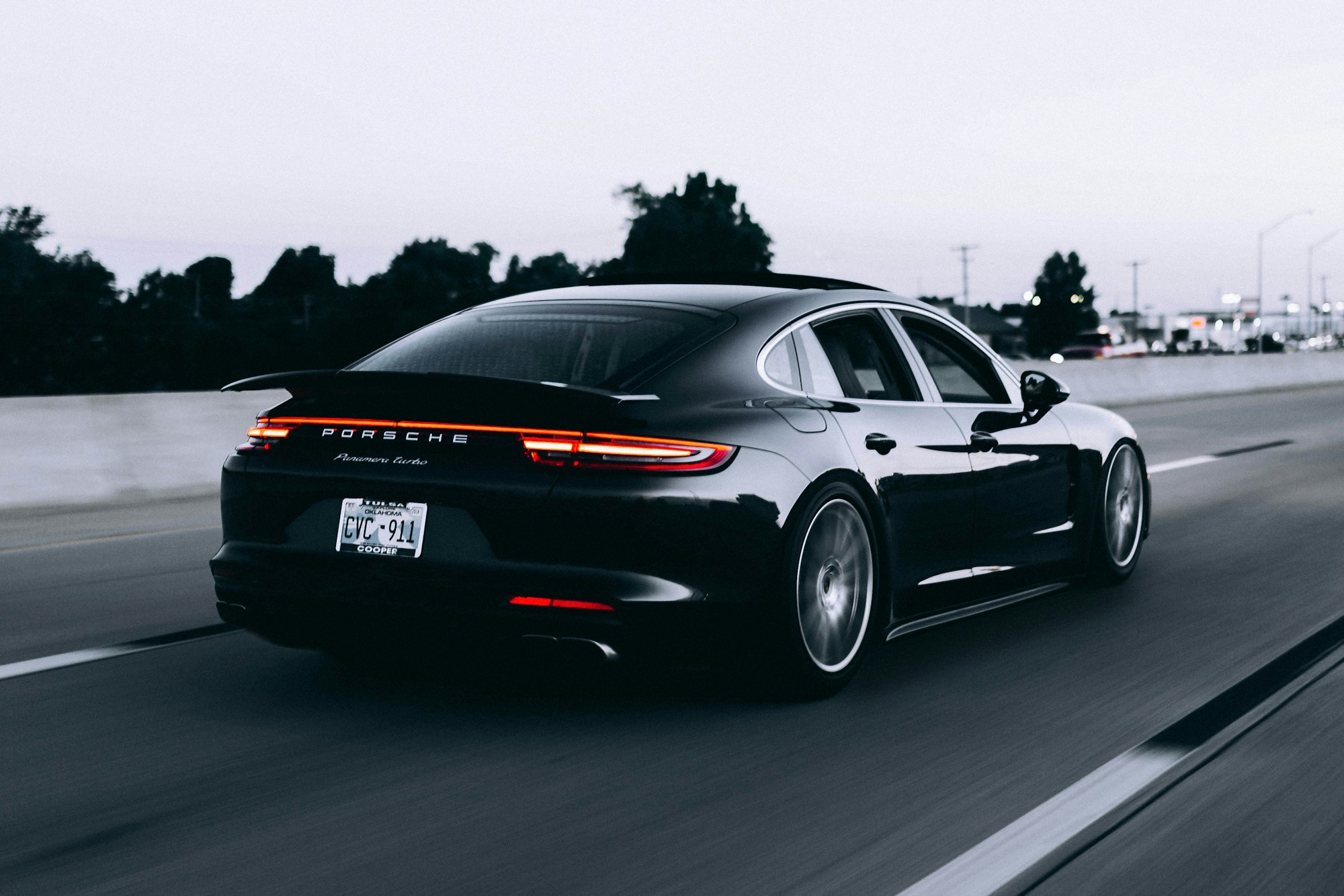 Light reflecting along clean black bodywork